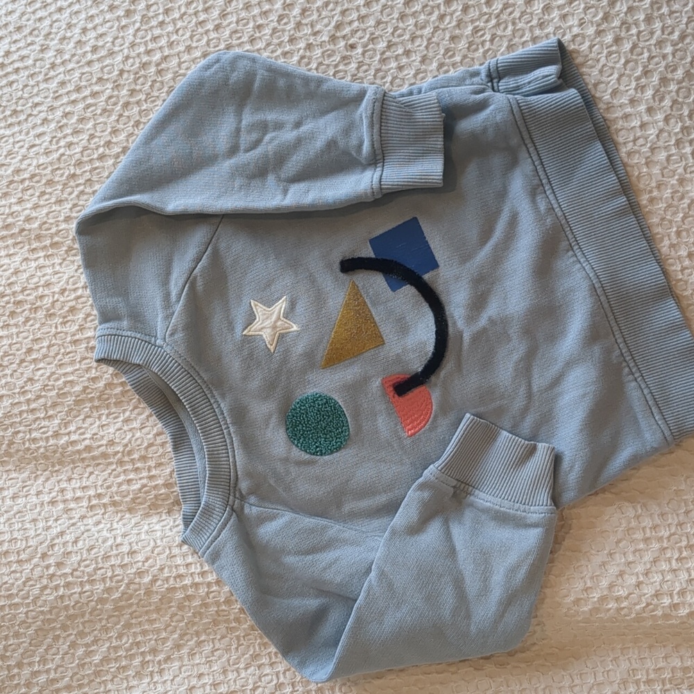 Hanna Andersson Blue Toddler Sweatshirt with Stars and Shapes.